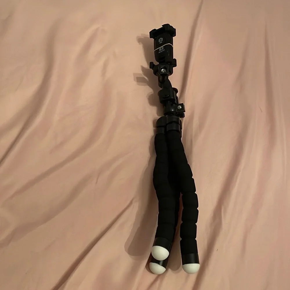 UBeesize 3 legged tripod, black and white with Bluetooth remote.